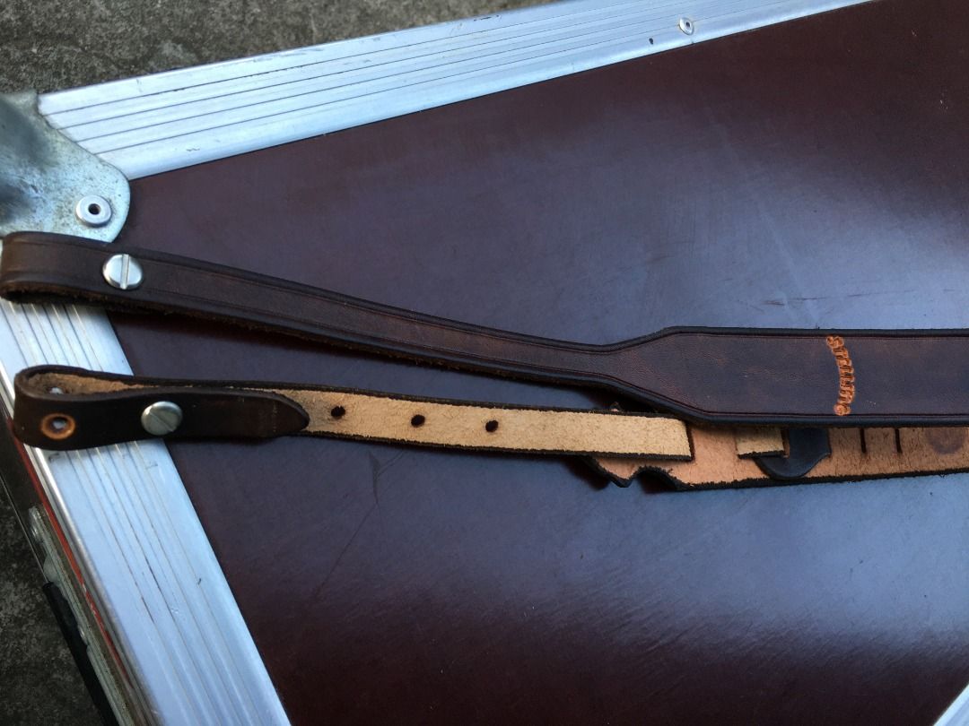 DOGWOOD DESIGN LEATHER BANJO STRAP (Category: Musical Instruments) located in Calamba. Submitted by marjoh29436 (Listing ID 1356749898, Image 3). Description: Leather Straps for 5 String Banjo, Logo “Dogwood Designs and David Schenk” and marked “STELLING” in embossed. The straps are custom made from finest oak tanned tooling leather, screw rivets with design, high quality leather banjo straps and are easily adjustable to fit anyone large or small