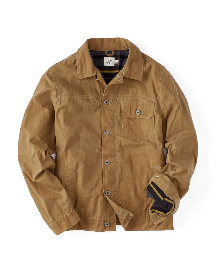 Flint and Tinder Flannel-Lined Waxed Trucker Jacket (Category: Coats, Jackets and Outerwear) located in San Juan City. Submitted by cvudy (Listing ID 1356711455, Image 2). Description: Color: Field Tan Size: Large RFS: Too big for me. For more info on the jacket please check on Flint and Tinder's website. https://huckberry.com/store/flint-and-tinder/category/p/55166-flannel-lined-waxed-trucker-jacket?srsltid=AfmBOorMwnni1DlDTv3ui5aMZh2HGCCnj_Pv1O