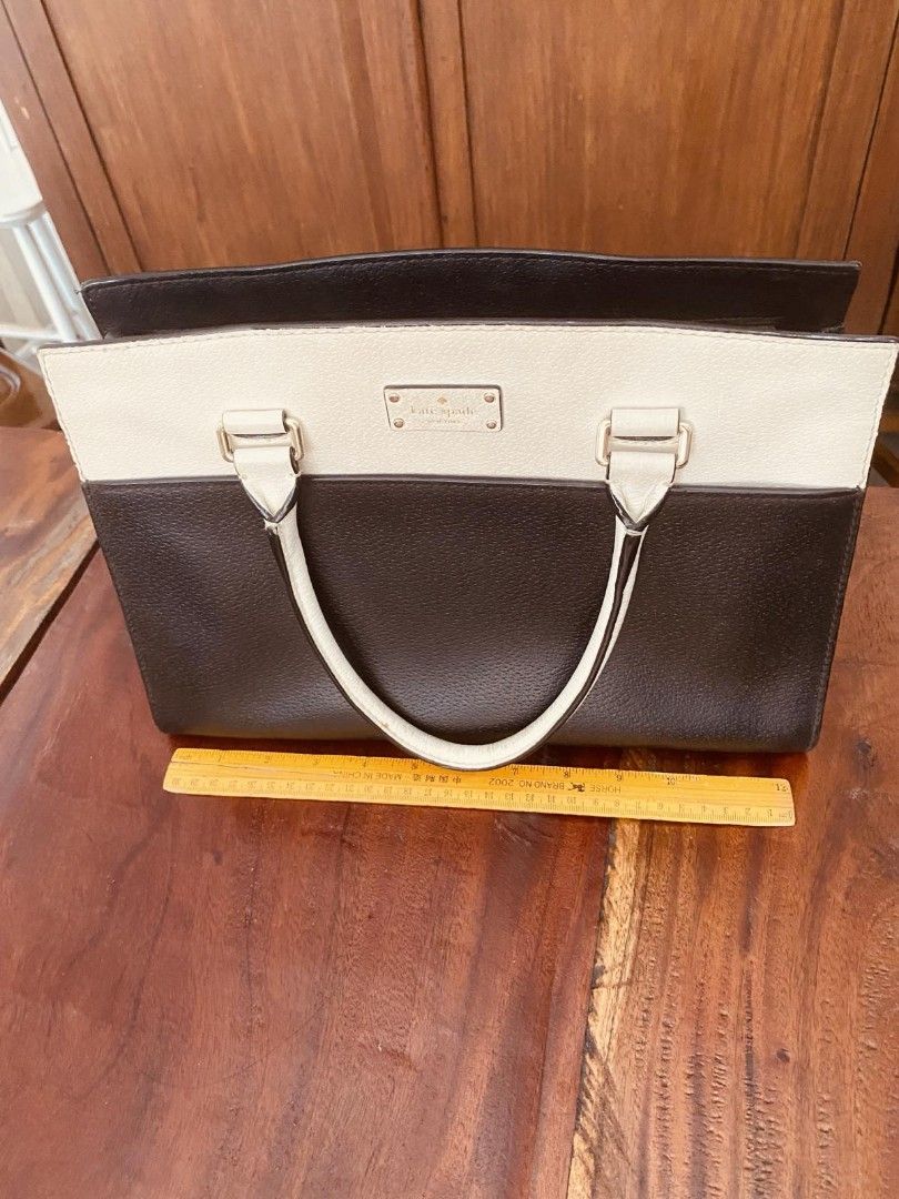 Kate Spade Grove Street Caley Satchel (Category: Shoulder Bags) located in Bulacan. Submitted by orange.locker (Listing ID 1356629685, Image 2). Description: with interior pockets Interior tag label with sling slot no strap included dust bag not included with minimal stains.