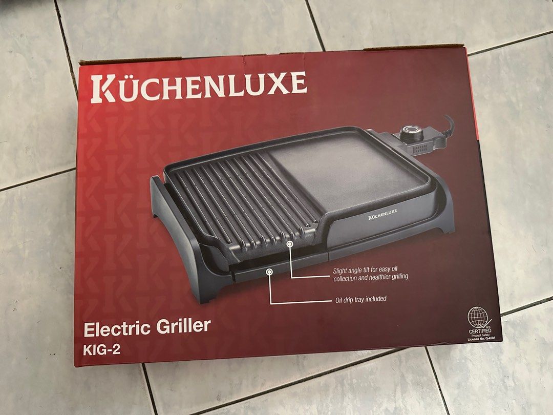 Kuchenluxe 2in1 electric griller (Category: Cookware & Accessories) located in Cebu City. Submitted by anythingforsale06 (Listing ID 1356674050, Image 1). Description: Electric griller •2in1 Flat And Grill Plate • Adjustable temperature knol • Non-stick coating for easy cleaning • With oil collection tray • Cool touch body • Anti slip feet ₱2,800 Only .