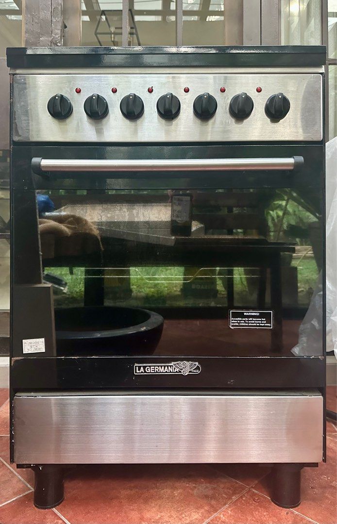 La Germania Electric Cooking Range (Category: Other Kitchen Appliances) located in Quezon City. Submitted by bonggabuys (Listing ID 1356628696, Image 1). Description: La Germania Electric Cooking Range 60cm width - 6004 series (specs in attached picture) 4 electric burners (1 burner newly replaced) Lighting indicators brand new Newly inspected Shipping c/o buyer.