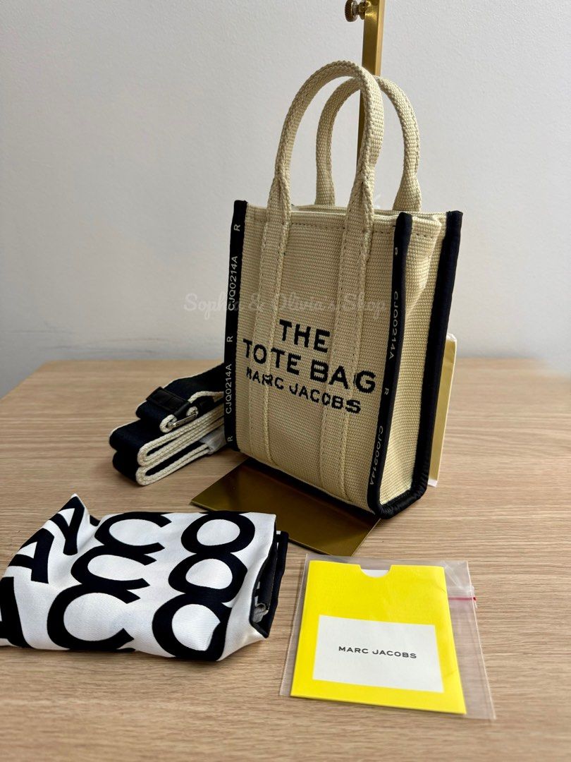 Marc Jacobs Mini the Jacquard Tote in White Sand (Category: Luxury Bags & Wallets) located in Pasig City. Submitted by ellaandviashop (Listing ID 1356682247, Image 2). Description: 🇵🇭 On hand and ready to ship via lalamove/lbc 🇺🇸 Fresh arrivals 🆕 Authentic and brand new ✅ Comes with tag, some with care card, gift receipt, polyplastic 💳 Credit cards accepted .