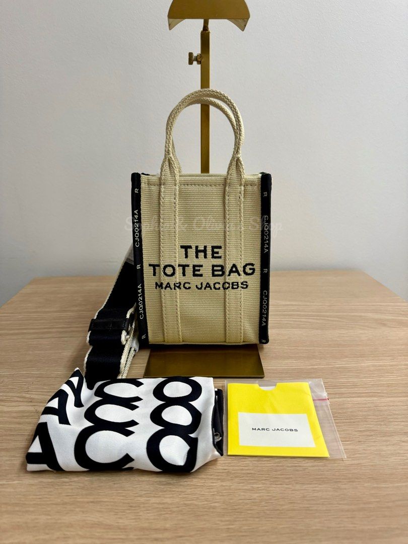 Marc Jacobs Mini the Jacquard Tote in White Sand (Category: Luxury Bags & Wallets) located in Pasig City. Submitted by ellaandviashop (Listing ID 1356682247, Image 1). Description: 🇵🇭 On hand and ready to ship via lalamove/lbc 🇺🇸 Fresh arrivals 🆕 Authentic and brand new ✅ Comes with tag, some with care card, gift receipt, polyplastic 💳 Credit cards accepted .
