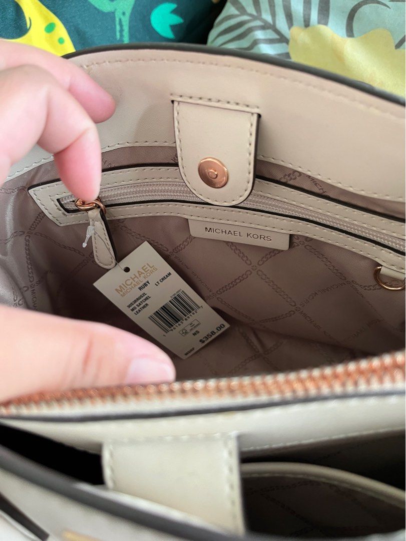 MK Ruby Satchel (Category: Luxury Bags & Wallets) located in Manila. Submitted by sukkiri_declutter (Listing ID 1356751040, Image 3). Description: BNEW with tag kaso walaNg strap. Naiwan sa US..