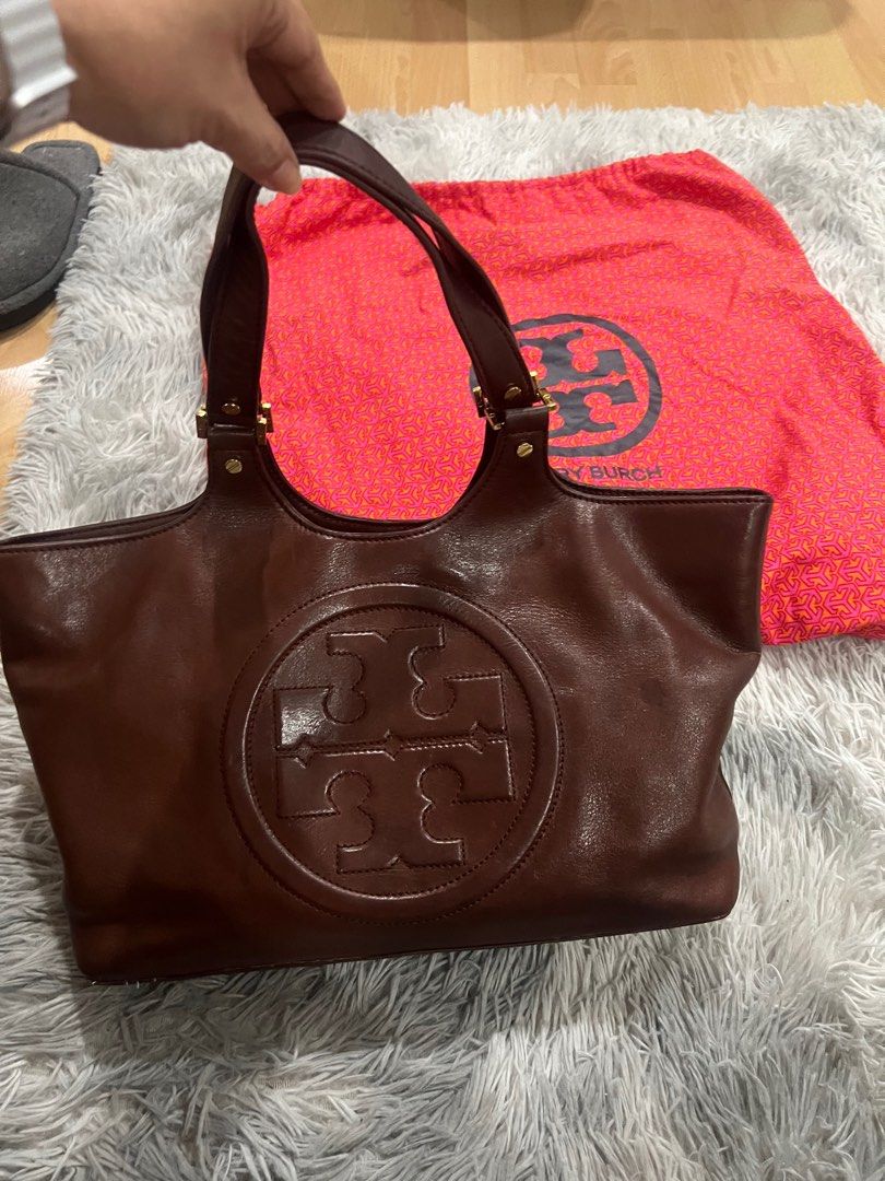 Original Tory Burch (Category: Luxury Bags & Wallets) located in Quezon City. Submitted by tangled8 (Listing ID 1356724142, Image 1). Description: Original Tory Burch bought in USA. Color Brown complete with dust bag and paper bag.