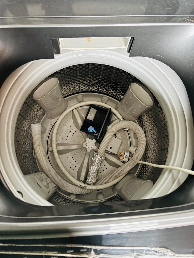 Sharp Washing Machine (Category: Washing Machines and Dryers) located in Kuala Lumpur. Submitted by mnabil1712 (Listing ID 1356724428, Image 2). Description: Sharp 10kg top loading washing machine. Used but well taken care of. No vibrations, no motor issues, no dents on the buttons, no dents on the frame. Arrange own shipping. .