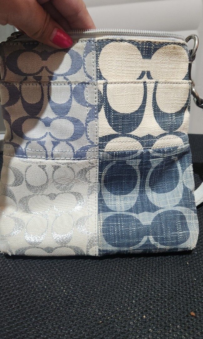 Small Coach patched work cross-body bag (Category: Luxury Bags & Wallets) located in Pasig City. Submitted by smartshopping.ph (Listing ID 1356636829, Image 3). Description: cute. with flaws, some silver coating on the sides are starting to peel but the handle are still in good condition. This can still last in the next 5 yrs. can fit iPhone, wallet and make-up kit.