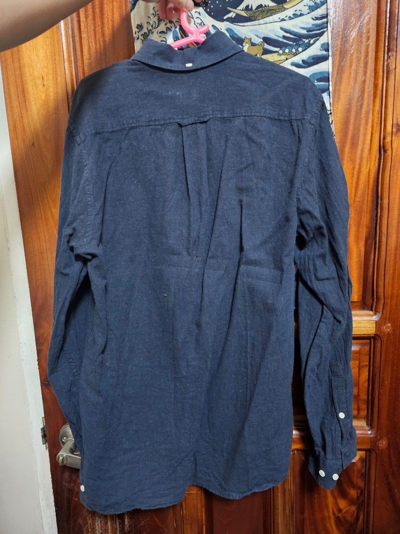 Uniqlo half button down polo (Category: Formal Shirts) located in Antipolo. Submitted by satisfactorylemon (Listing ID 1356717828, Image 2). Description: Uniqlo half button down shirt No issues, no stains Decluttering.