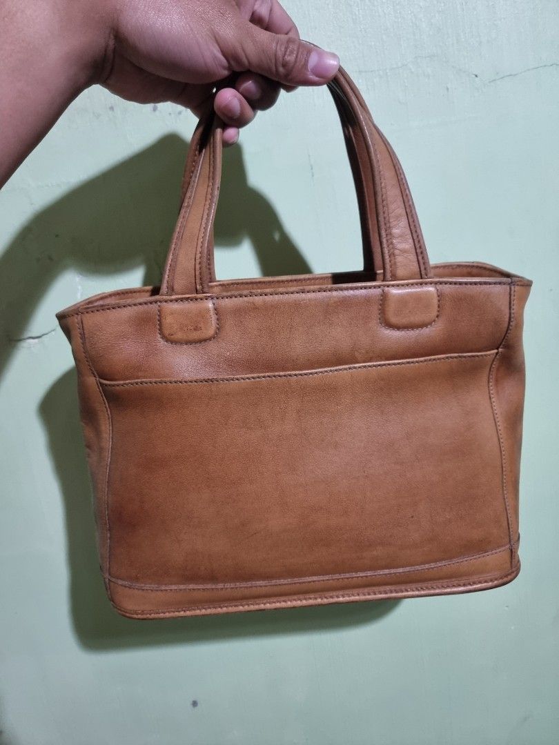 Vintage Coach Bleeker (Category: Luxury Bags & Wallets) located in Cabanatuan. Submitted by thegreatandpowerfulnathan (Listing ID 1356698694, Image 2). Description: Vintage Coach Bleeker Brown Color Made in the USA in 1998 Normal signs of usage for a vintage bag This bag has been cleaned and moisturized already to prolong its life. Mode of Delivery: J&T Mode of payment: GCASH Meet-up: City Mall, Sta. Rosa, Nueva Ecija Notes: •Shipping fee will be