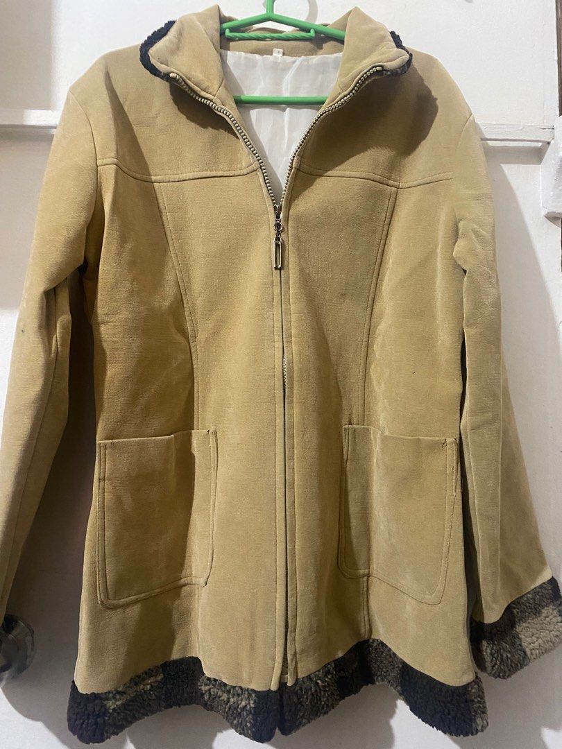 Brown suede Wool (Category: Coats, Jackets and Outerwear) located in Quezon City. Submitted by shemboti (Listing ID 1356860935, Image 1). Description: Perfect for winter and autumn! Kept me warm during my Vietnam and Japan trip! The fur details is also nice Fits S-M Can fit to large if slim arms Issue: may slight bakbak lang sa bulsa pero not noticeable..