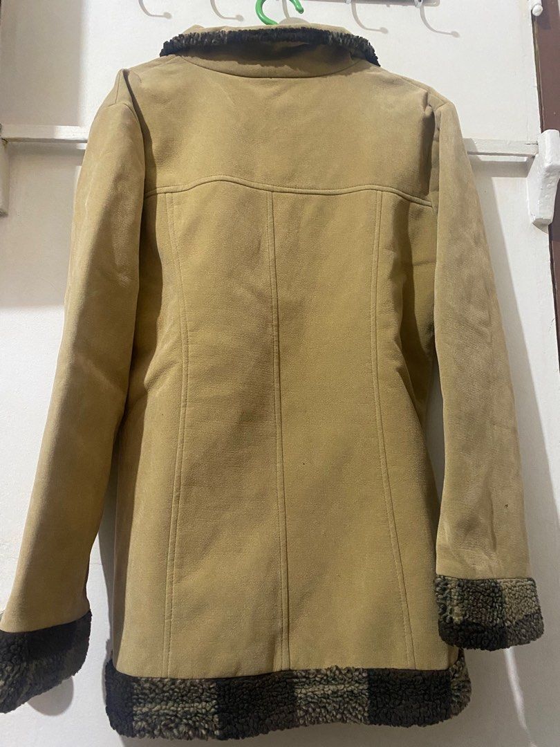 Brown suede Wool (Category: Coats, Jackets and Outerwear) located in Quezon City. Submitted by shemboti (Listing ID 1356860935, Image 2). Description: Perfect for winter and autumn! Kept me warm during my Vietnam and Japan trip! The fur details is also nice Fits S-M Can fit to large if slim arms Issue: may slight bakbak lang sa bulsa pero not noticeable..