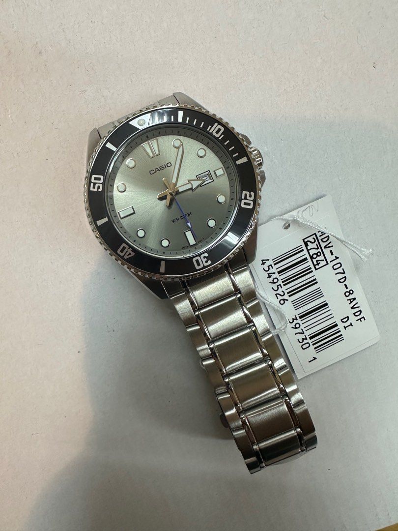 Casio Duro MDV-107D-8A (Category: Men's Watches) located in Manila. Submitted by seikowatchfactory (Listing ID 1356890161, Image 2). Description: BNIB 10/10 Model: MDV107D-8A Price: 3995 pesos Specifications: Case Size: 49.5 x 46.3 x 12.1mm Weight: 144g Case and Bezel material: Stainless Steel/Aluminum Stainless Steel Band One-touch 3-fold clasp 200-meter Water Resistance Approx. battery life: 3 years on SR626SW Mineral Glass Regular timekeeping 