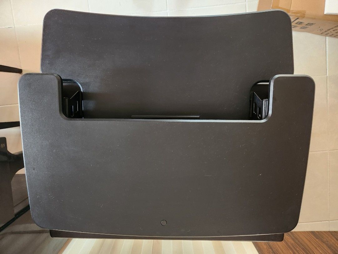Computer Table (Category: Other Home Furniture) located in Singapore. Submitted by blissout (Listing ID 1356878716, Image 2). Description: Ergoedge desk riser for sitting and standing. 76cm x 60cm to sit on a desk with smooth hydraulics extension to max of 50cm height. Removeable keyboard tray. 14.7kg - requires transportation #workfromhome #workstanding #work #ergonomics.