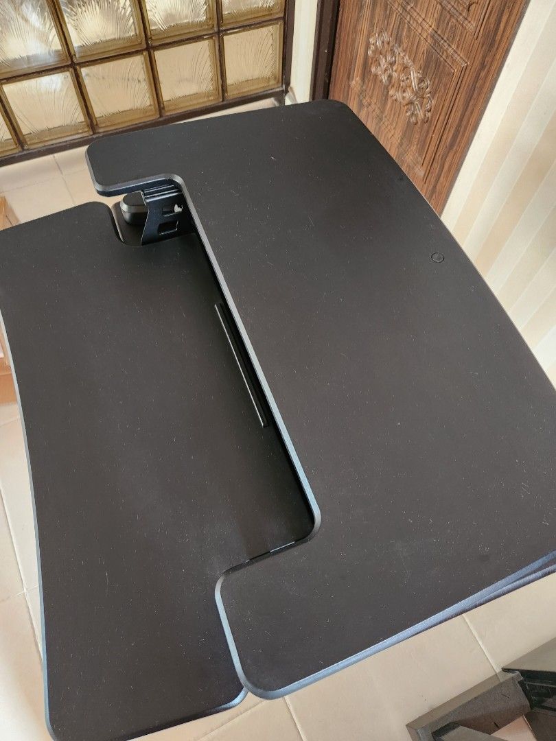 Computer Table (Category: Other Home Furniture) located in Singapore. Submitted by blissout (Listing ID 1356878716, Image 3). Description: Ergoedge desk riser for sitting and standing. 76cm x 60cm to sit on a desk with smooth hydraulics extension to max of 50cm height. Removeable keyboard tray. 14.7kg - requires transportation #workfromhome #workstanding #work #ergonomics.