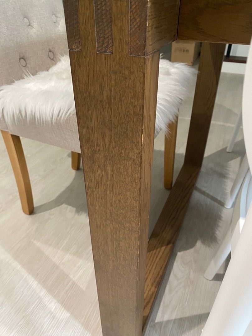 Dining table (Category: Tables & Sets) located in Singapore. Submitted by dmajor7 (Listing ID 1356851060, Image 3). Description: Almost perfect condition! Only tiny scratches on one of the legs. **Only use for 1 year (all halal foods only). Bought at $799 from Ikea. Selling for only $430 Quality: Heavy, very sturdy Measurements: Length: 140 cm Width: 85 cm Height: 75 cm Colour: Oak veneer brown stained.