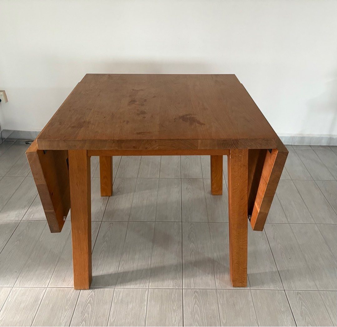 Dining Table (Category: Tables & Sets) located in Singapore. Submitted by eang1606 (Listing ID 1356923601, Image 2). Description: Foldable wood table, the entire length is around 1.5m. .