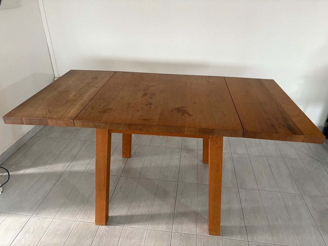 Dining Table (Category: Tables & Sets) located in Singapore. Submitted by eang1606 (Listing ID 1356923601, Image 1). Description: Foldable wood table, the entire length is around 1.5m. .