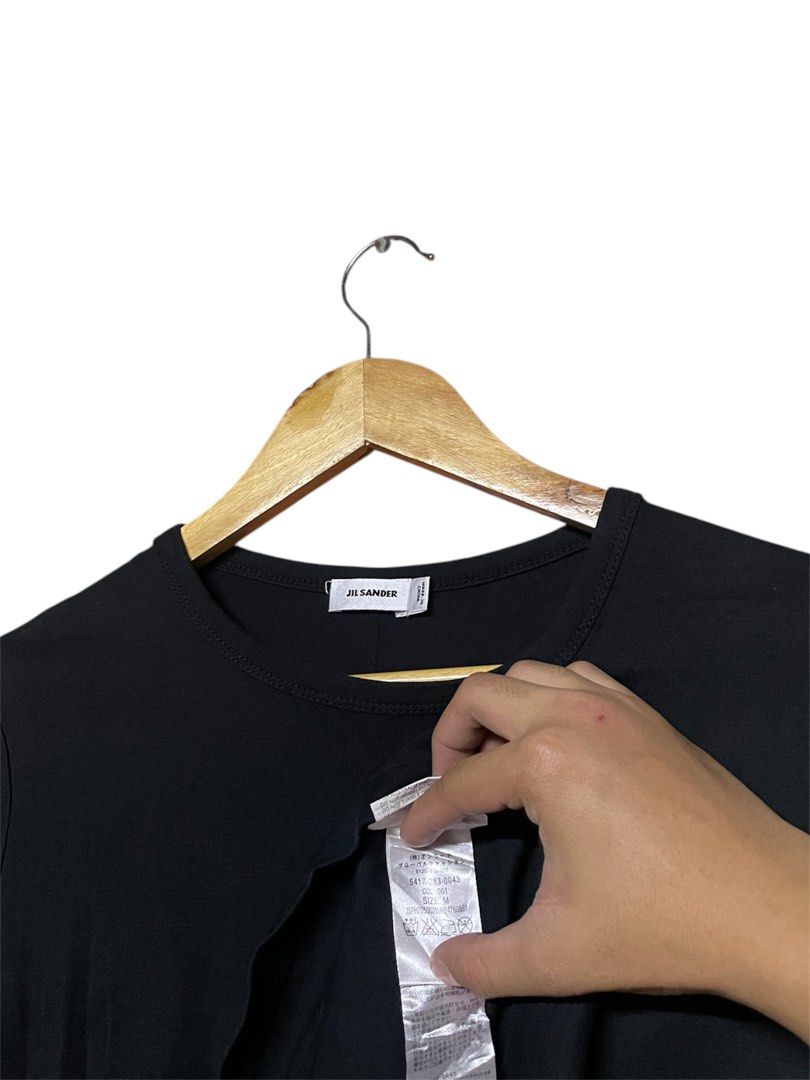 Jil Sander Plain Black Tee Stretch Women (Category: Blouses) located in Cabuyao City. Submitted by ParadisethriftedPh (Listing ID 1356965466, Image 3). Description: 9.8/10 color rate Dimensions W: 16-18 L: 24.
