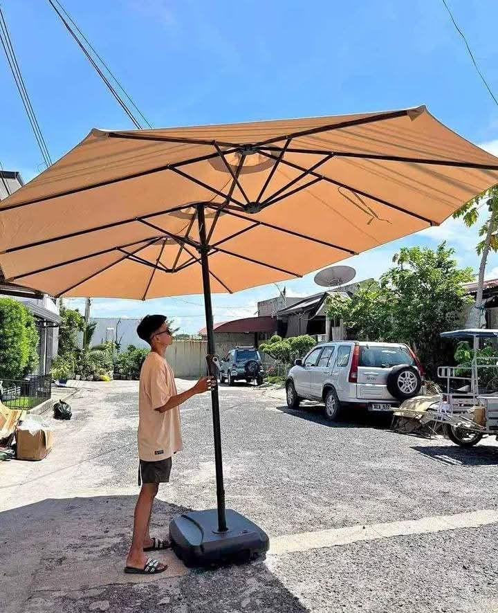 Patio umbrella 3in1 (Category: Umbrellas) located in Manila. Submitted by asstditems (Listing ID 1356877867, Image 1). Description: Same day delivery via Lalamove Location: Manila Mop: Cod/Gcash payment Pm for inquiries..