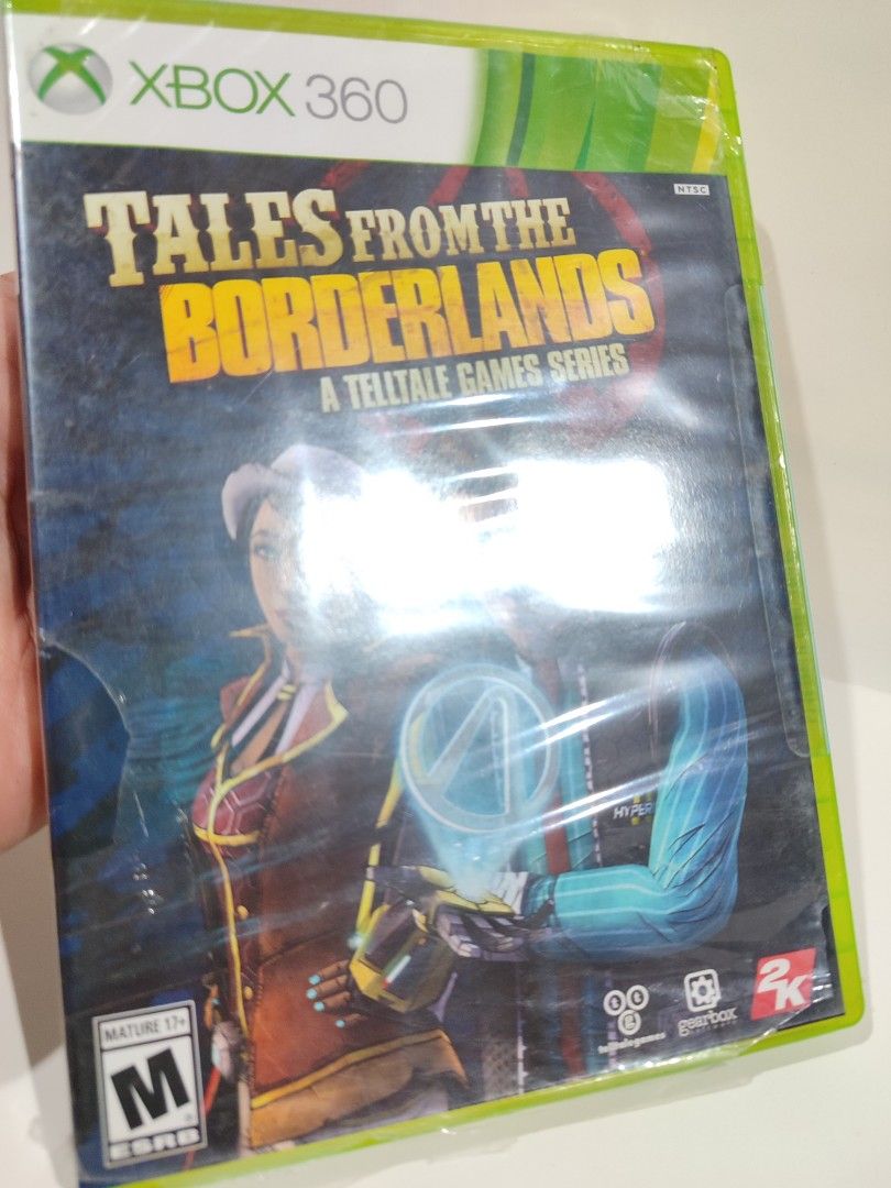 XBOX 360 - Tales from the Borderlands (BRAND NEW) "NTSC" (Category: Xbox) located in Mendez-Nunez. Submitted by sf2_gameshop (Listing ID 1356922607, Image 2). Description: PLEASE READ: Works on the following Xbox 360 unit with region: PAL - ? (Untested) NTSC/J - ? (Untested) NTSC/UC - √ (Yes) CONDITION: a brand new item though its plastic wrap has many tears (see photos). The sticker seal is intact. GENRE: Graphic-adventure, interactive film MODE