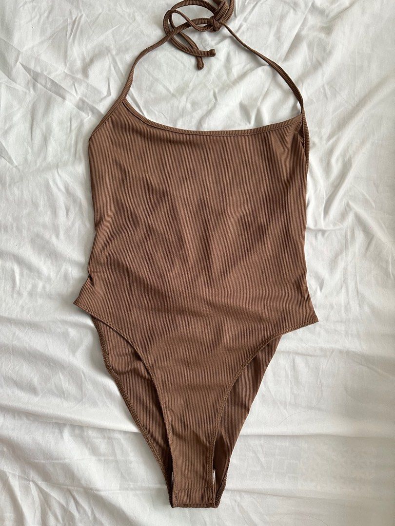 Brown Sleeveless Halter Bodysuit (Category: Sleeveless) located in Marikina City. Submitted by lvshrt (Listing ID 1357056437, Image 2). Description: -never been used -mop: gcash -mod: grab/lalamove.