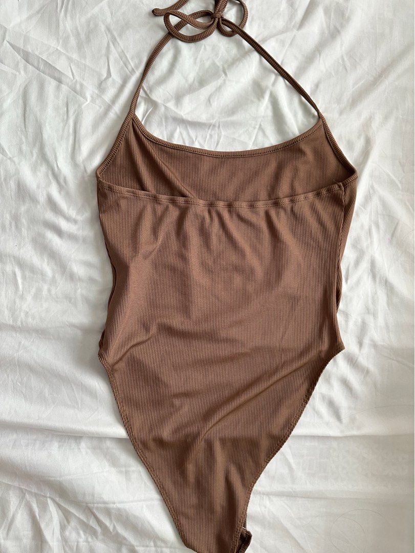 Brown Sleeveless Halter Bodysuit (Category: Sleeveless) located in Marikina City. Submitted by lvshrt (Listing ID 1357056437, Image 3). Description: -never been used -mop: gcash -mod: grab/lalamove.