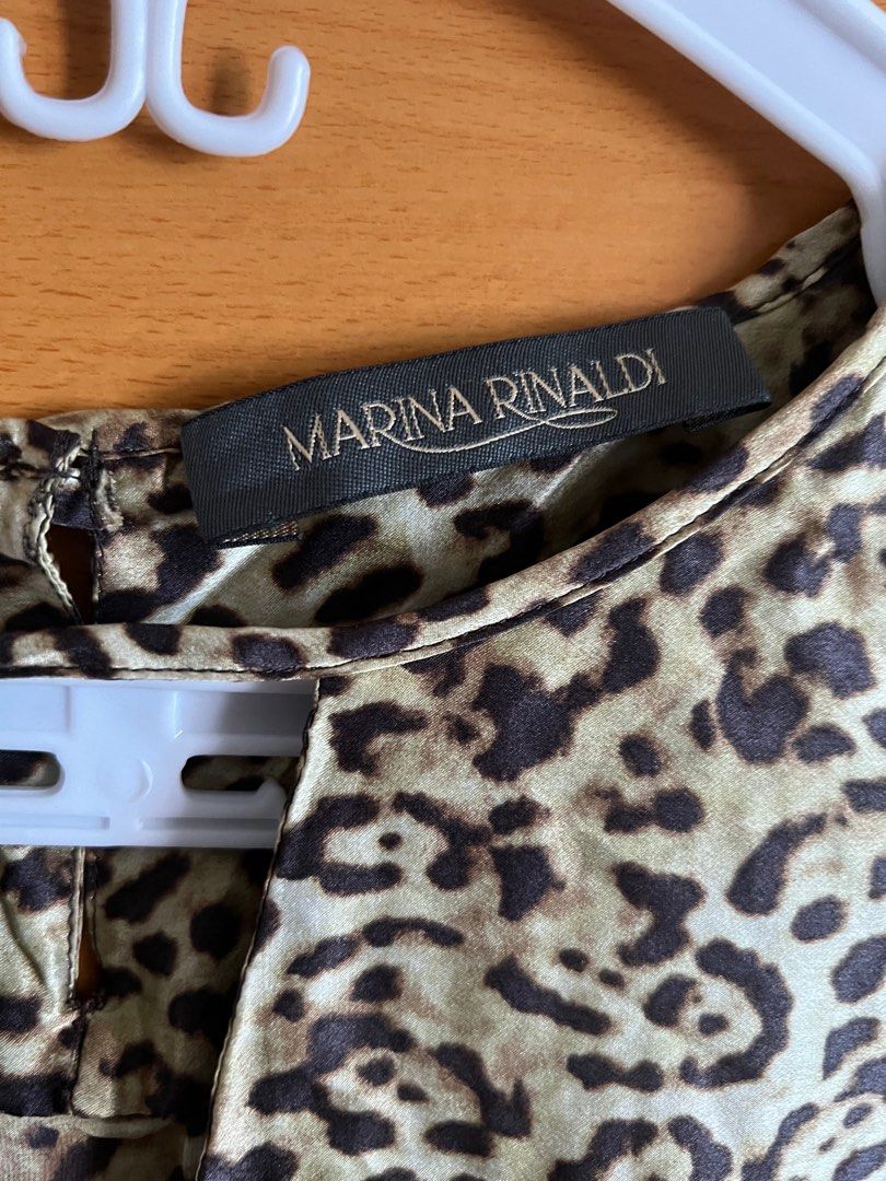 Cheetah Print Marina Rinaldi Blouse (Category: Blouses) located in Manila. Submitted by ciscosthrifter (Listing ID 1357021969, Image 3). Description: Dimes: Width (Pit to Pit): 16” Length: 23”.