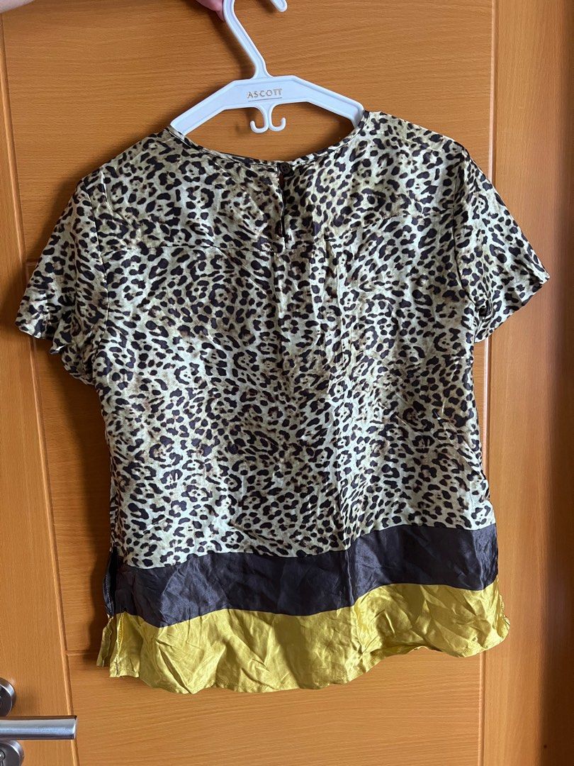 Cheetah Print Marina Rinaldi Blouse (Category: Blouses) located in Manila. Submitted by ciscosthrifter (Listing ID 1357021969, Image 2). Description: Dimes: Width (Pit to Pit): 16” Length: 23”.