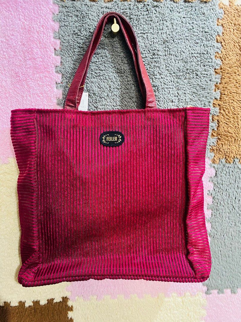 Feiler handbag bag (Category: Shoulder Bags) located in Bulacan. Submitted by stephyshop09 (Listing ID 1357068043, Image 3). Description: With tag pa ni feiler Maroon color Handbag Ykk zip Issue sa handle needs recolor Medyo malagkit . Or lagyan nyo ng twilly. .