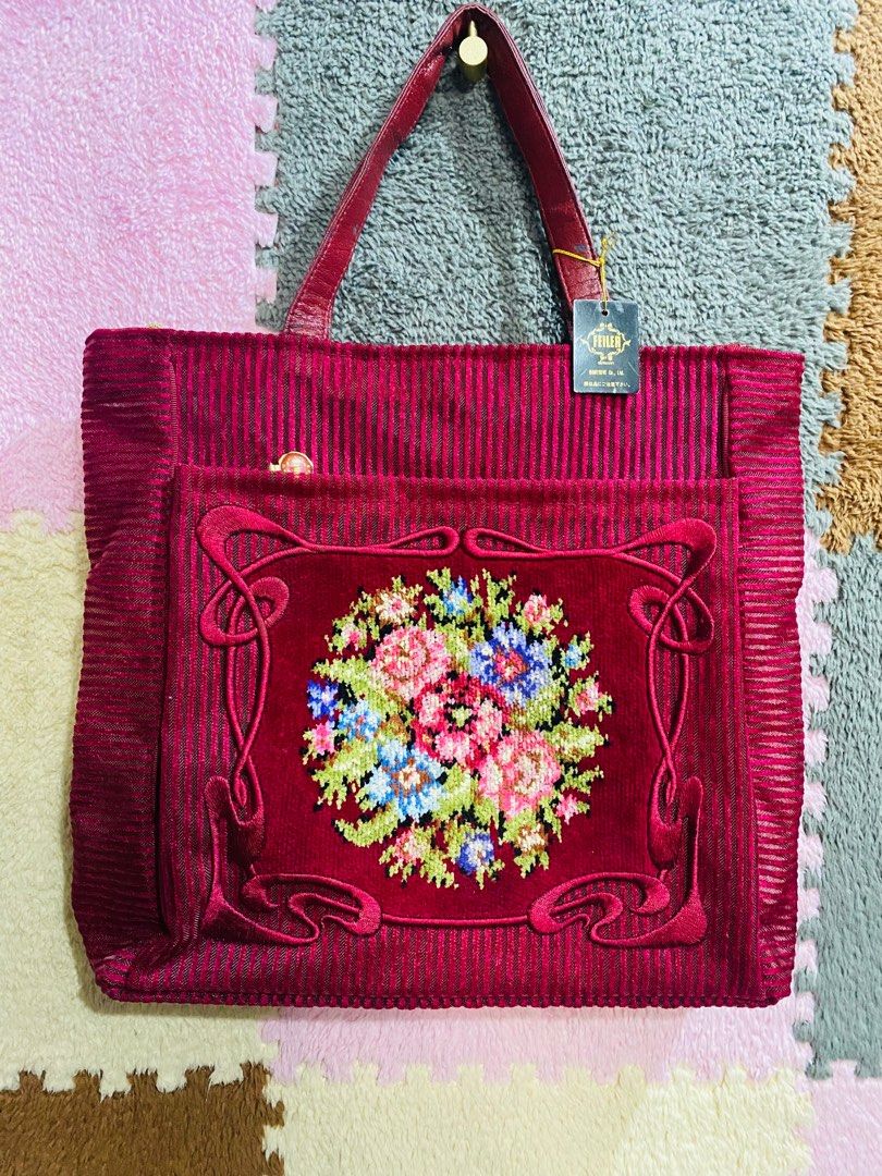 Feiler handbag bag (Category: Shoulder Bags) located in Bulacan. Submitted by stephyshop09 (Listing ID 1357068043, Image 1). Description: With tag pa ni feiler Maroon color Handbag Ykk zip Issue sa handle needs recolor Medyo malagkit . Or lagyan nyo ng twilly. .