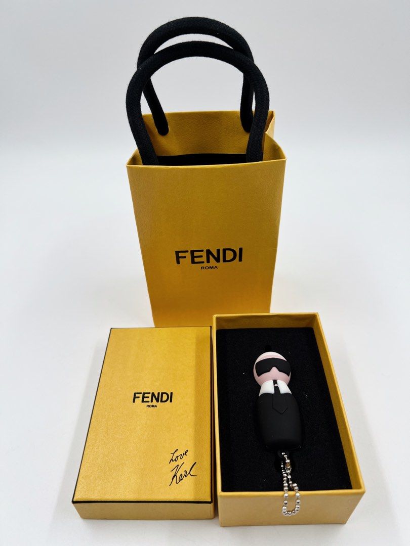 ⚜️Fendi Bag Charm (Flash Drive Card) (Category: Luxury Accessories) located in Makati City. Submitted by 90sangel (Listing ID 1357164205, Image 2). Description: •Item: Fendi USB memory flash drive •Condition: Brand New (not for sale) Novelty gift * This whimsical bag charm is composed of a mulicolored PVC in the shape of Karlito. It features a removable USB drive that pulls out from the base and a bright pink mohawk. This is a perfect bag charm f