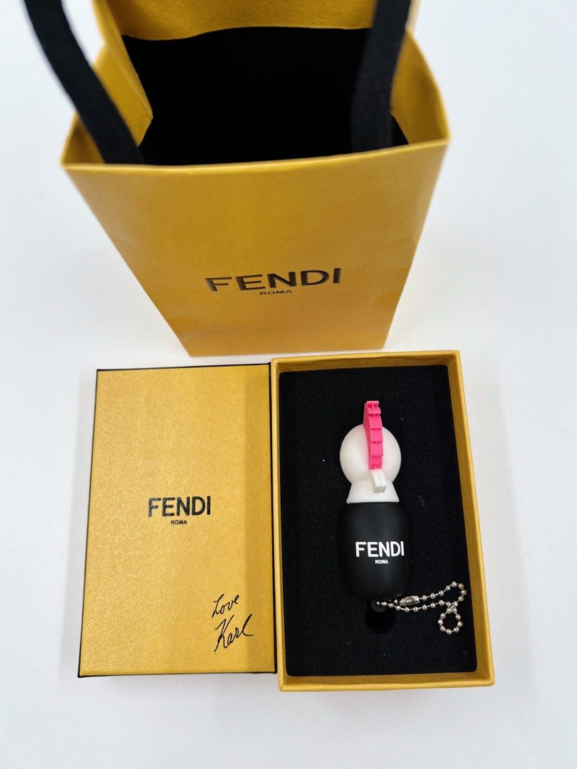 ⚜️Fendi Bag Charm (Flash Drive Card) (Category: Luxury Accessories) located in Makati City. Submitted by 90sangel (Listing ID 1357164205, Image 3). Description: •Item: Fendi USB memory flash drive •Condition: Brand New (not for sale) Novelty gift * This whimsical bag charm is composed of a mulicolored PVC in the shape of Karlito. It features a removable USB drive that pulls out from the base and a bright pink mohawk. This is a perfect bag charm f