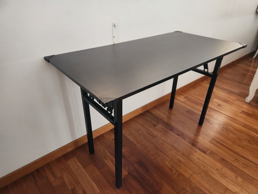 Foldable Table (Category: Tables & Sets) located in Singapore. Submitted by 24601 (Listing ID 1355259126, Image 2). Description: Lightly used foldable black table that can be used for multiple purposes. Size: 120 cm x 60 cm..