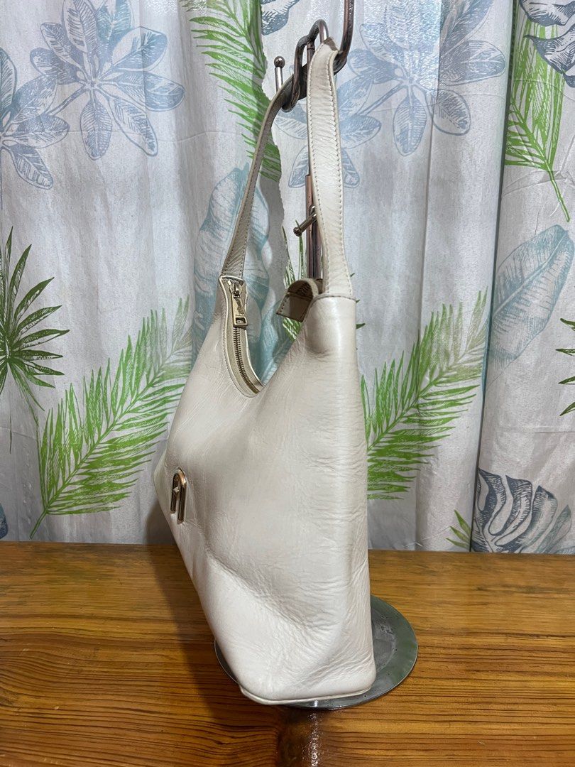 Furla White Shoulder bag (Category: Luxury Bags & Wallets) located in Baguio. Submitted by blossombeauty.chicfinds23 (Listing ID 1357081401, Image 2). Description: VGC 13”w, 9”h, 3”b authentic plus shippingfee thru j&t or JRS No Cop/Cod .