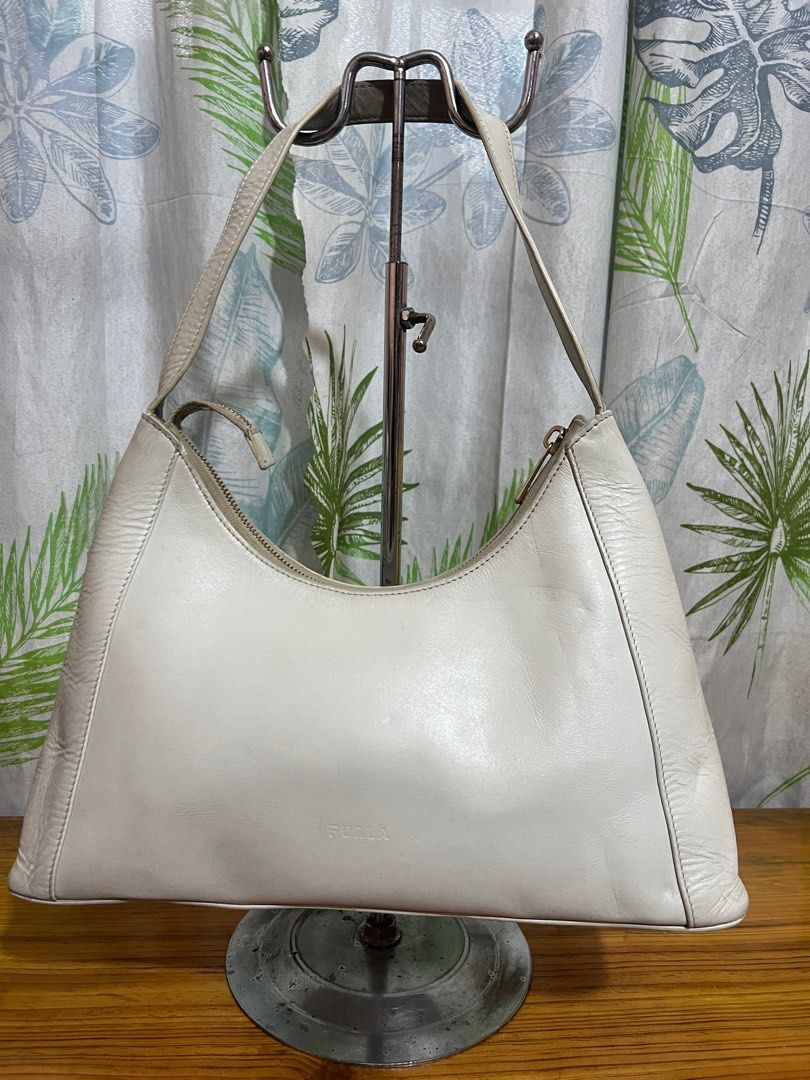 Furla White Shoulder bag (Category: Luxury Bags & Wallets) located in Baguio. Submitted by blossombeauty.chicfinds23 (Listing ID 1357081401, Image 3). Description: VGC 13”w, 9”h, 3”b authentic plus shippingfee thru j&t or JRS No Cop/Cod .