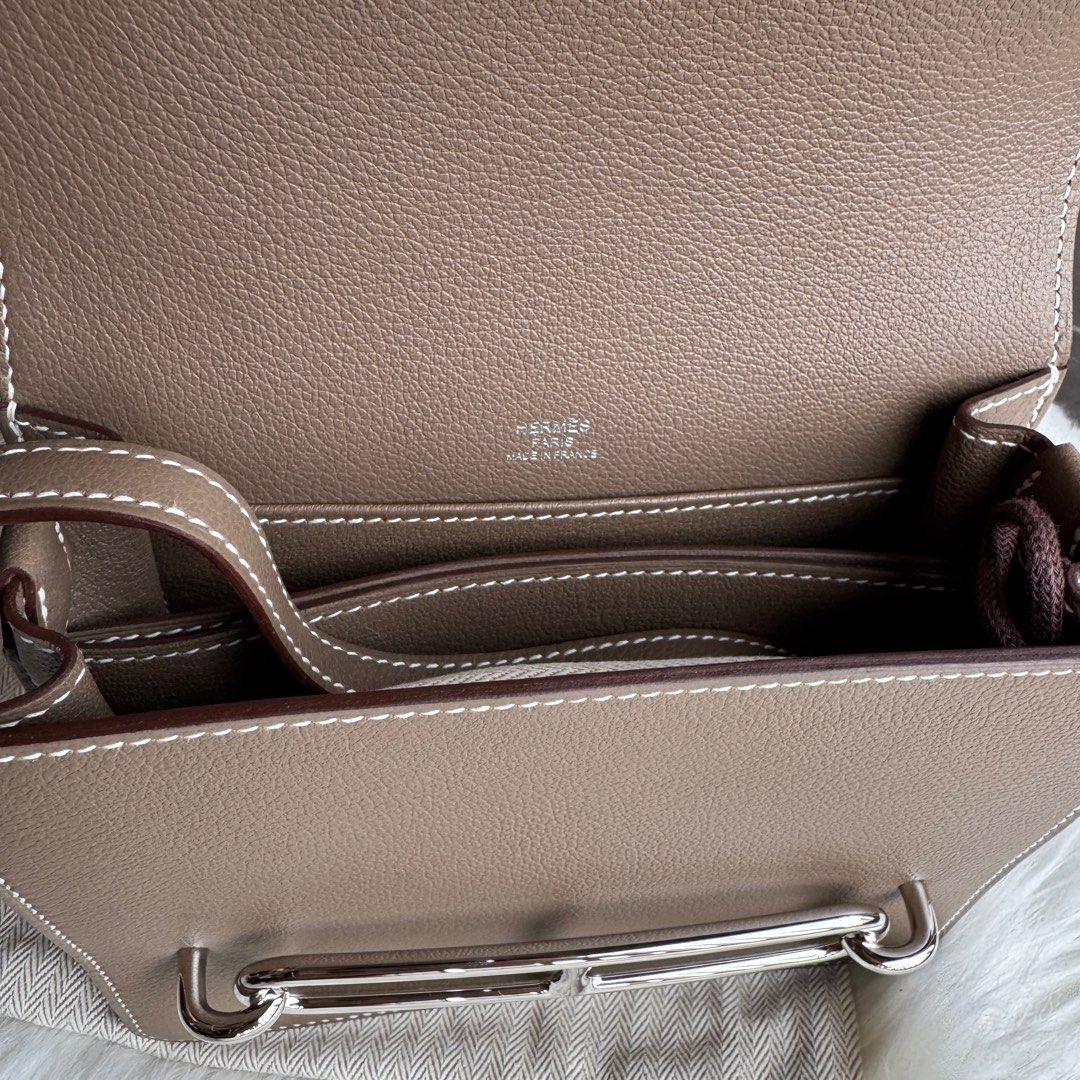 Hermes Roulis Mini Bag Evercolor Etoupe Permabrass (Category: Bags & Wallets) located in Singapore. Submitted by missbrownbear (Listing ID 1357070670, Image 3). Description: Brand new full set 2025 SG receipt W Stamp Etoupe .