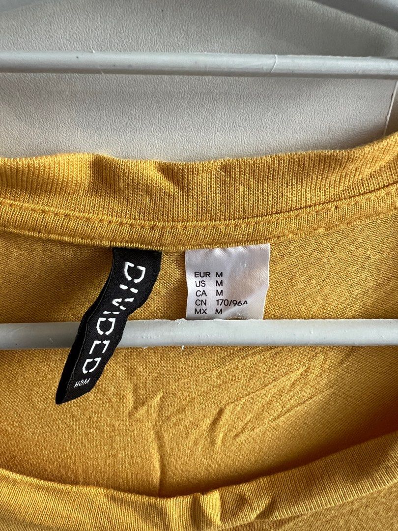 H&M yellow shirt (Category: Shirts) located in Bulacan. Submitted by lezzdeclutter (Listing ID 1357088967, Image 2). Description: Size medium Very cutesy ✨ Personal fave NO Flaws 💯 Rfs: decluttering since i’m now pregnant 📍Malolos, Bulacan .
