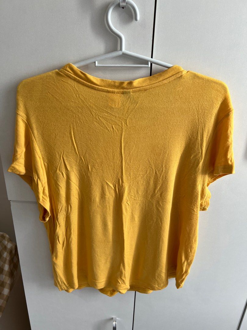 H&M yellow shirt (Category: Shirts) located in Bulacan. Submitted by lezzdeclutter (Listing ID 1357088967, Image 3). Description: Size medium Very cutesy ✨ Personal fave NO Flaws 💯 Rfs: decluttering since i’m now pregnant 📍Malolos, Bulacan .