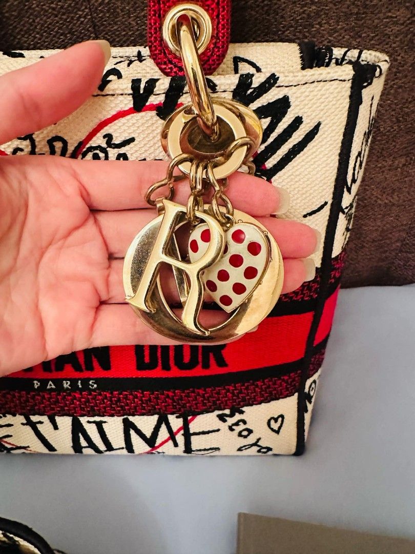 Lady Dior DLite canvas Graffiti (Category: Luxury Bags & Wallets) located in Manila. Submitted by lookforless (Listing ID 1357180737, Image 2). Description: Lady Dior Graffiti good condition guaranteed authentic.