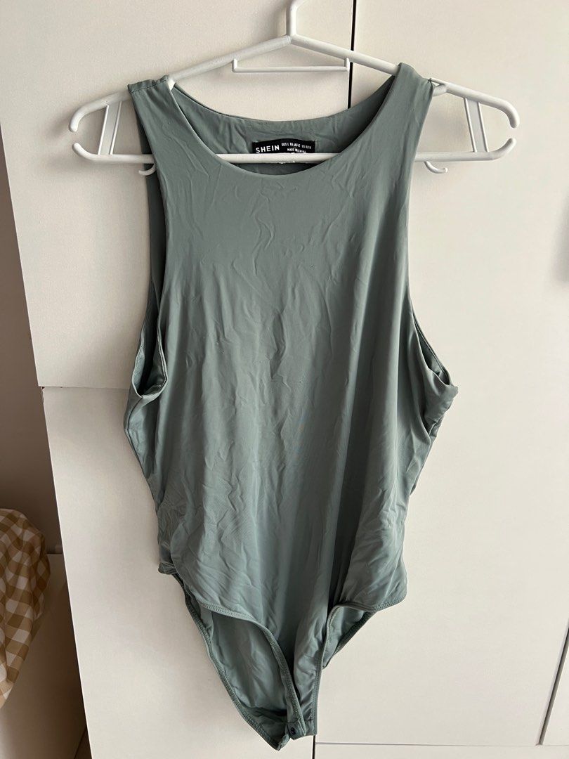 Shein blue green bodysuit (Category: Sleeveless) located in Bulacan. Submitted by lezzdeclutter (Listing ID 1357089344, Image 1). Description: Size Large Very cutesy ✨ Personal fave NO Flaws 💯 Rfs: decluttering since i’m now pregnant 📍Malolos, Bulacan .