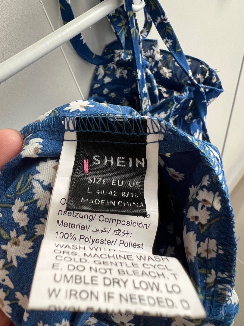 Shein floral tietop (Category: Sleeveless) located in Bulacan. Submitted by lezzdeclutter (Listing ID 1357090288, Image 3). Description: Size Large Very cutesy ✨ Personal fave NO Flaws 💯 Rfs: decluttering since i’m now pregnant 📍Malolos, Bulacan .
