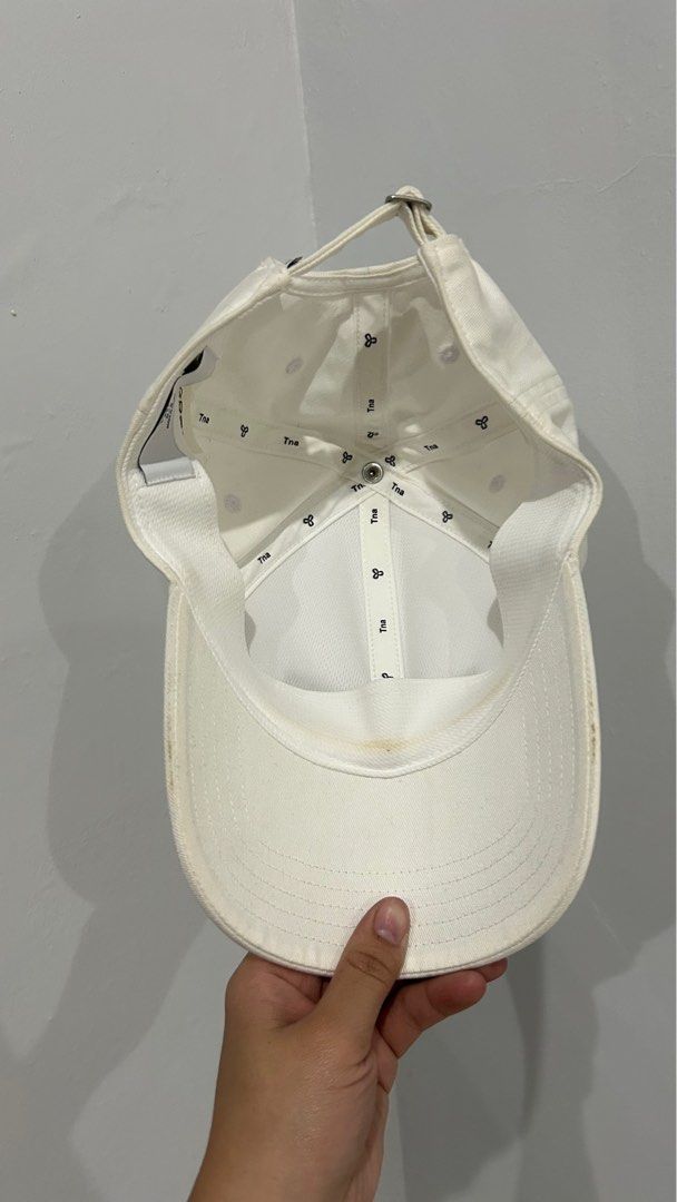 TNA cap (Category: Caps & Hats) located in San Fernando. Submitted by preclutter (Listing ID 1357152161, Image 2). Description: - stock lang - good condition - you can see the issue in the picture - linis lang.