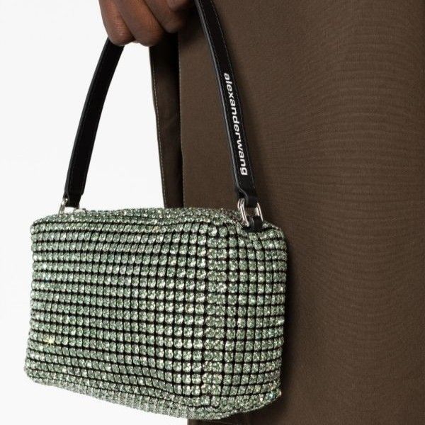 ALEXANDER WANG HEIRESS RHINESTONE POUCH (Category: Luxury Bags & Wallets) located in Manila. Submitted by mnlhappybattle (Listing ID 1357287680, Image 1). Description: ALEXANDER WANG HEIRESS RHINESTONE POUCH Good condition minimal issue (check last photo) medium-sized pouch bag in white crystal rhinestone chain mesh with a logo embossed top handlepolyester lining top zip closure interior leather logo patch embossed contrast logo at strap dimensio
