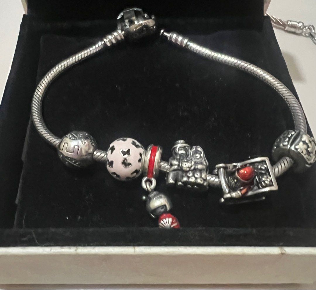 Authentic pandora bracelet with old box (Category: Bracelets) located in Paranaque City. Submitted by waslovedbymomsh (Listing ID 1357197490, Image 3). Description: Pandora bracelet with Married couple charm Santa on sleigh charm Butterfly clasp and other clasps.