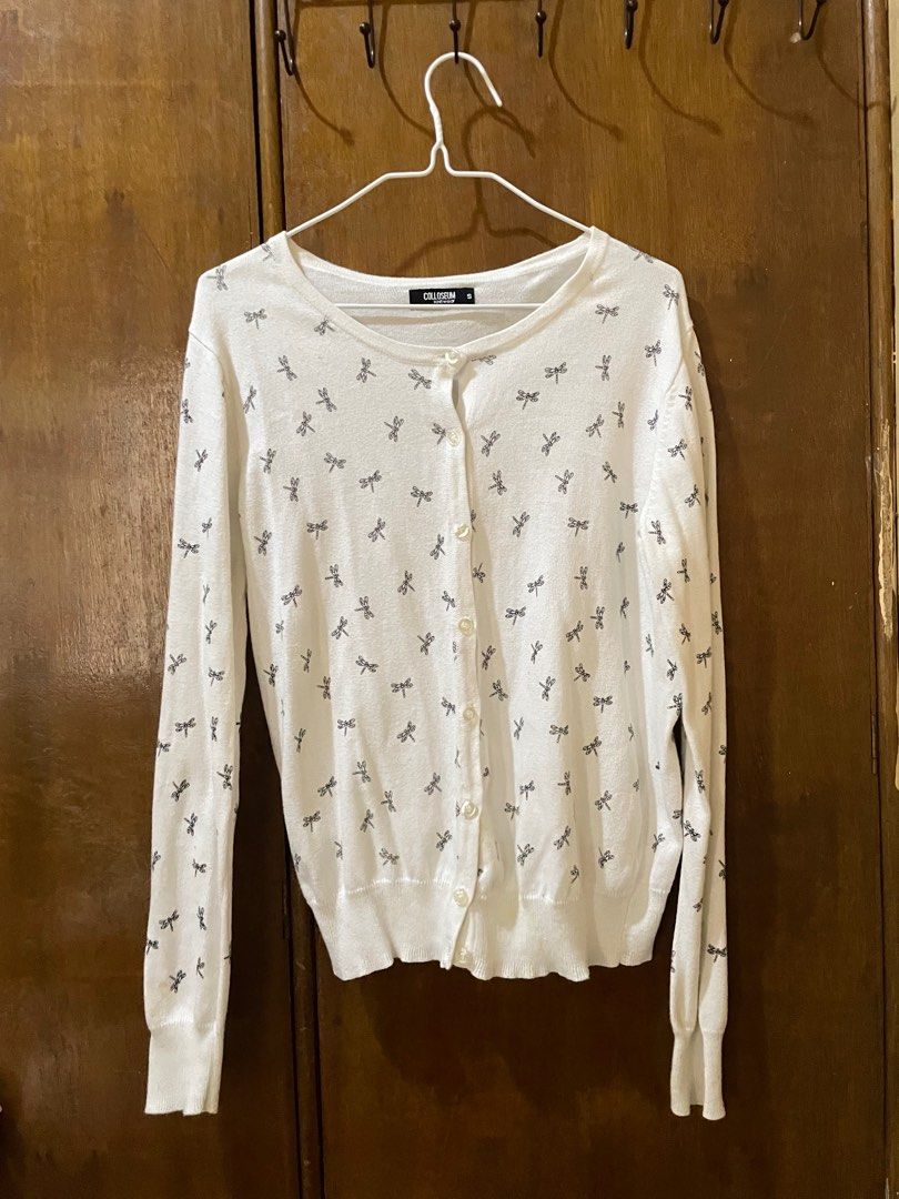 COLLOSEUM White Cardigan KIDS (Category: Longsleeves) located in Bacoor. Submitted by s4dee (Listing ID 1357265891, Image 1). Description: size: small - dragonfly prints - honest issue: •washable stains (natambak lang) •small hole (very unnoticeable).