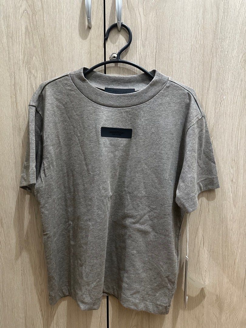 Fear of God - Tee Gray (Category: Shirts) located in Taguig. Submitted by gnarlill (Listing ID 1357347151, Image 1). Description: FOR SALE Essentials Fear of God Tees Small Women size Gray and Black colors only available Authentic and Brand New with tag but no ziplock PM for more information and details .
