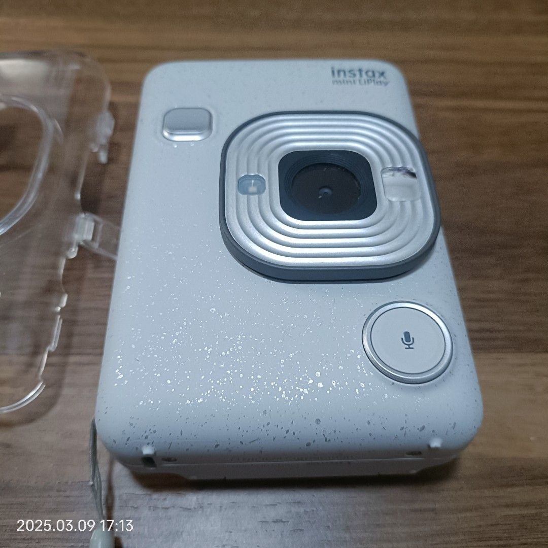 Fujifilm Instax Mini LiPlay Hybrid Instant Camera (Category: Cameras) located in Cainta. Submitted by sealga (Listing ID 1357288580, Image 2). Description: RFS: Decluttering, Rarely used Lady owned Naalagaan, walang gasgas Hindi nagagamit Includes: - Camera - Hand strap - Acrylic Case (with stickers on) - Charging Cord NO SD Card included NO box included.