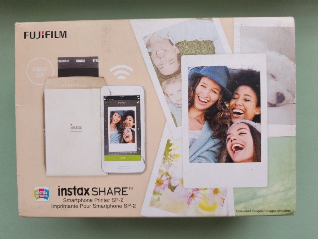 Fujifilm Instax share SP-2 (Gold) (Category: Cameras) located in Cabuyao City. Submitted by camillem (Listing ID 1357246312, Image 2). Description: •with complete box •can send a video of it printing • RFS: I don't use it that much anymore and need funds. •Can do meetups around BGC/Cubao.