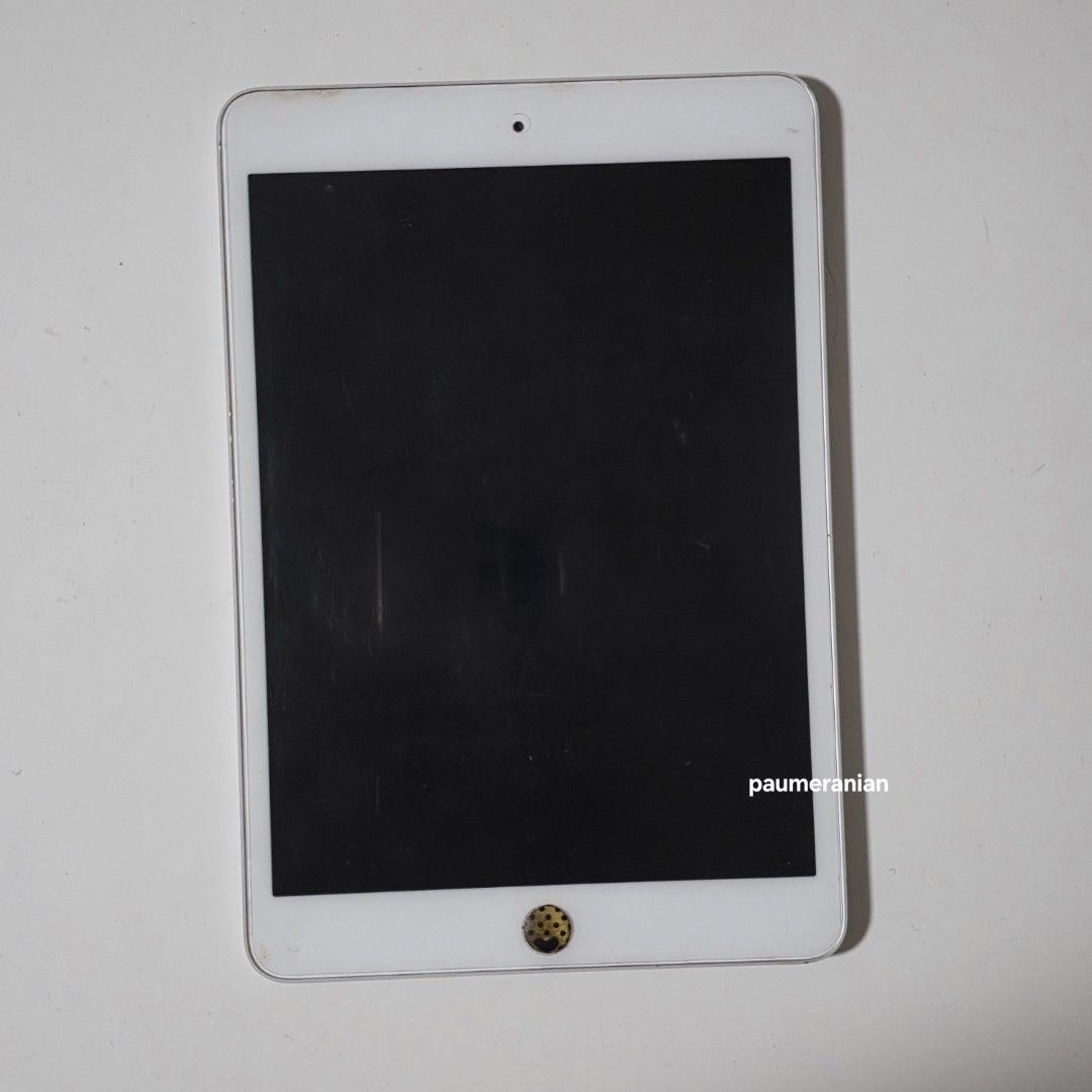 iPad mini 16GB Silver (1st Gen) (Category: iPad) located in Malabon City. Submitted by malabon.sisters (Listing ID 1357300653, Image 2). Description: iPad mini 16GB Silver - AS IS WHERE IS. will reset once paid - check photo for screen issue - with screen protector - fully functional - can use for FB, etc - No Youtube. di na sakop ng updates, unless you have a workaround - no charger included.
