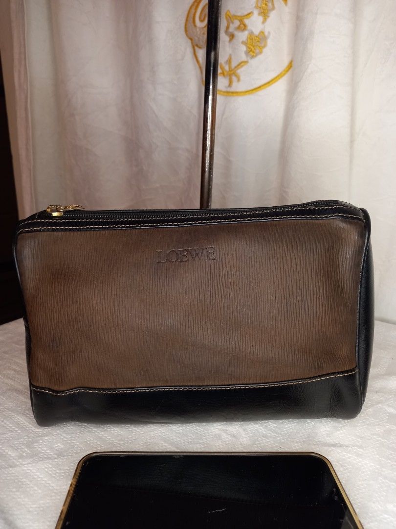 LOEWE Travel Pouch/ Organizer (Category: Luxury Bags & Wallets) located in Bacolod City. Submitted by lippi_bhalanx (Listing ID 1357280138, Image 1). Description: 9.5 x 4.5 x 6 inches dimensions Genuine leather no rubs no scratches on body Made in Spain.